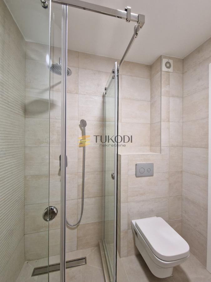 Nov, neuseljavan 1,5 stan- PREMIUM NOVOGRADNJA + parking mesto