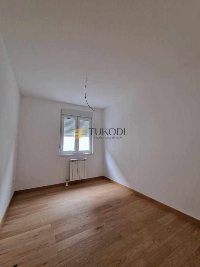 Nov, neuseljavan 1,5 stan- PREMIUM NOVOGRADNJA + parking mesto