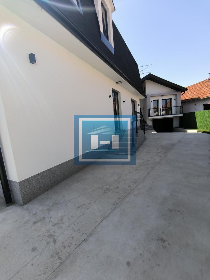 Luksuzna kuća sa dodatnim objektom – spoj elegancije, funkcionalnosti i prestižne lokacije